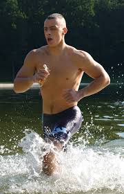 man jogging in water