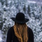 woman wearing black hat